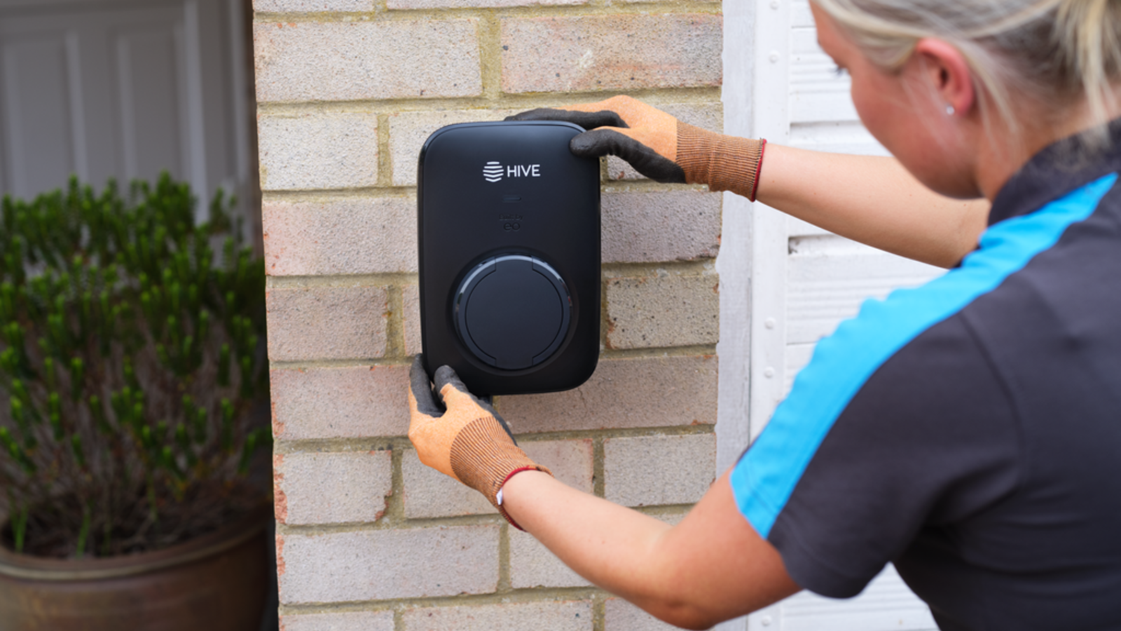 a person holding a speaker